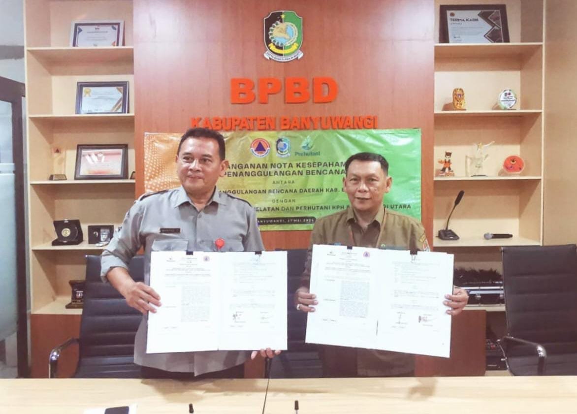 Danang Hartanto dan Tulus Budyadi selesai teken MOU tanggap bencana. (Foto: Endang Hartati)