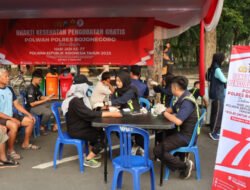 Polwan Polres Bojonegoro Gelar Bakti Kesehatan dan Pangan Murah di CFD, Ratusan Warga Serbu Layanan Gratis
