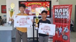Danish Iffat Rafif Gustatama dan Muhammad Sulthon Ash-Shidqi, kelas 5 SDN Kotakulon 1 Bondowoso, meraih juara pada event Olimpiade MTK IPAS dan Bahasa Inggris Tingkat SD/MI Se-kabupaten Bondowoso pada 17 Mei 2026. (Foto :SDN Kotakulon 1 Bondowoso - ZONA INDONESIA).
