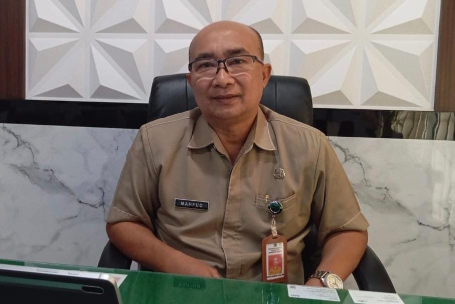 Mahfud Junaidi, Kepala Dinas Pemberdayaan Masyarakat dan Desa Kabupaten Bondowoso. (Foto : Istimewa - ZONA INDONESIA).